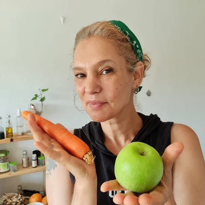 woman holding apple